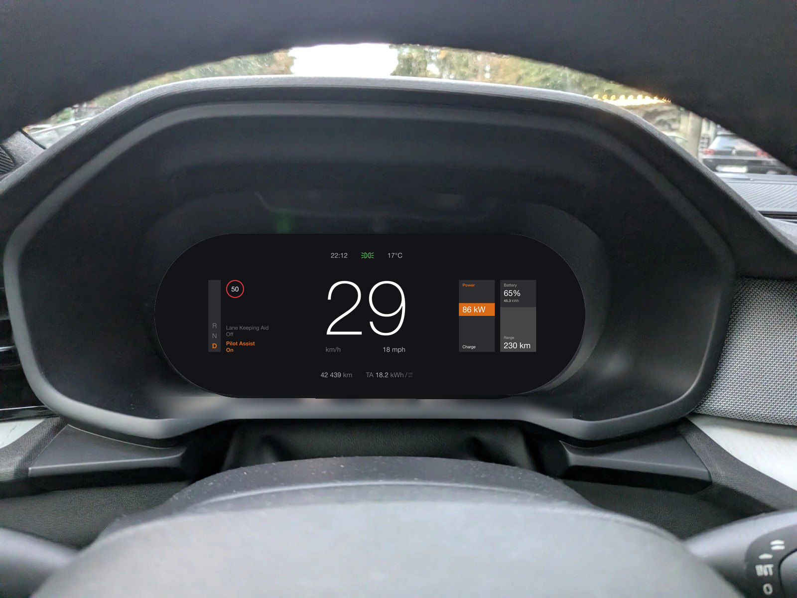 The proposed version in the real photograph, seen through the steering wheel